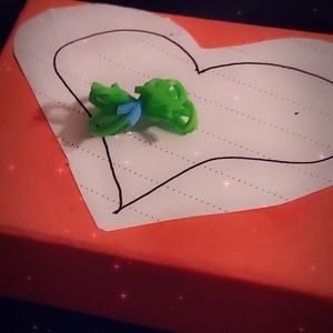 We are selling a green and blue bow.